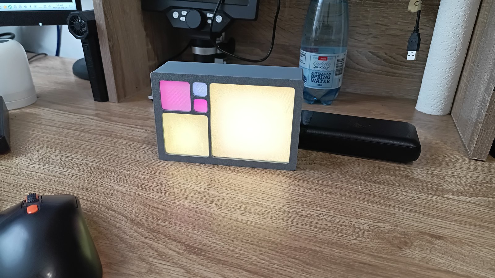 Fibonacci Light Box V15 lit with cool blue and green colours