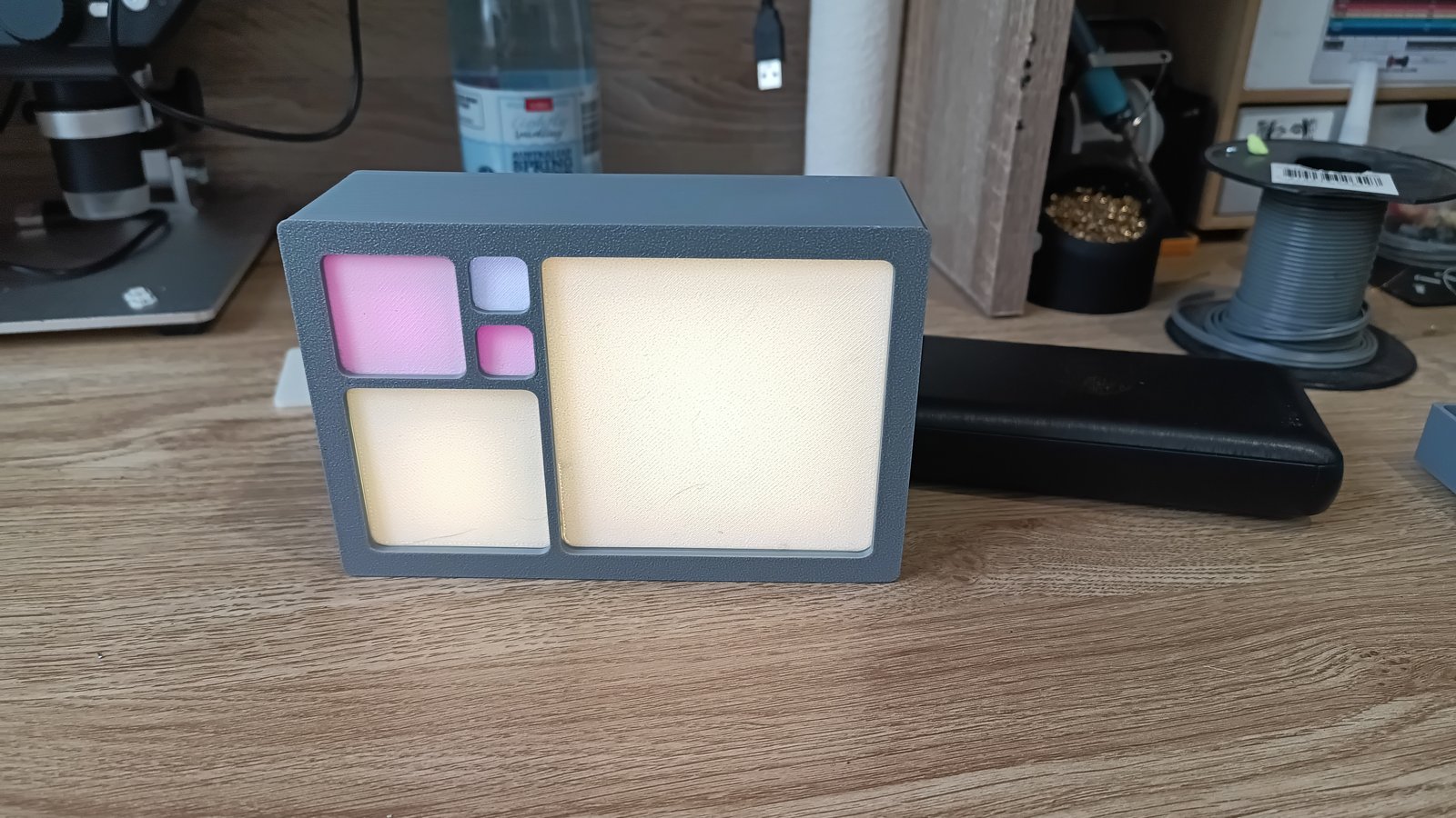 Fibonacci Light Box V15 lit with warm pink tones